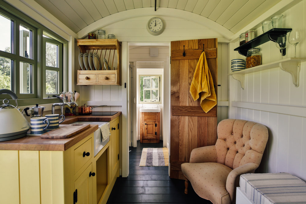  Interior photography of shepherds hut guest room kitchen area 