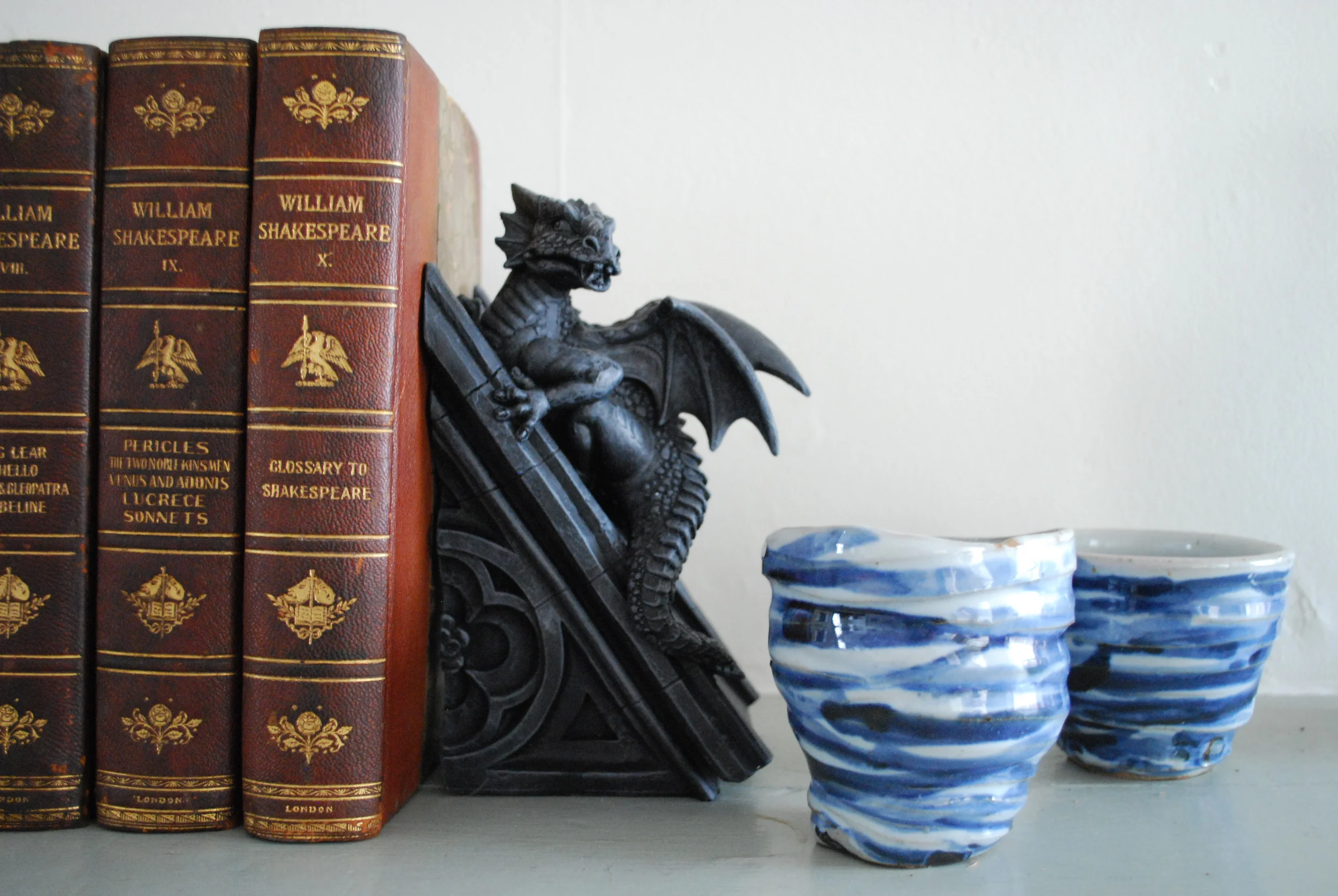 upstairs bookend and staff-made pottery