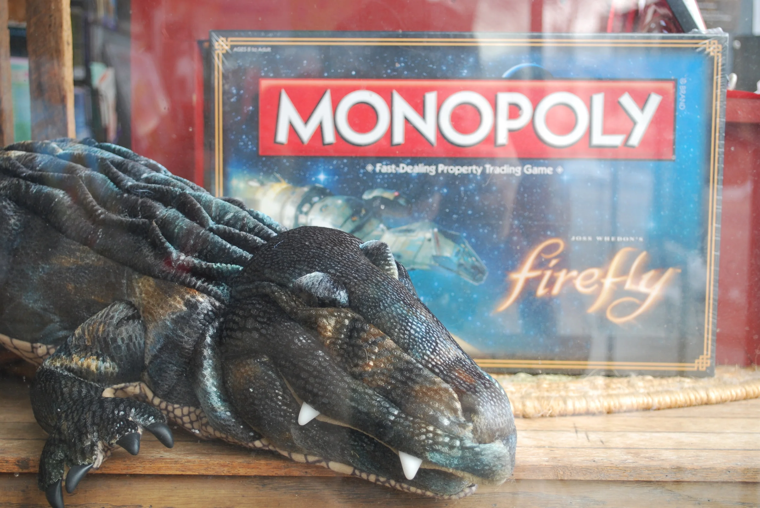 Monopoly Firefly guarded by a Folkmanis Alligator