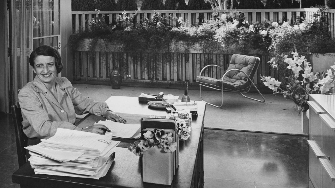 ayn rand at desk.jpeg