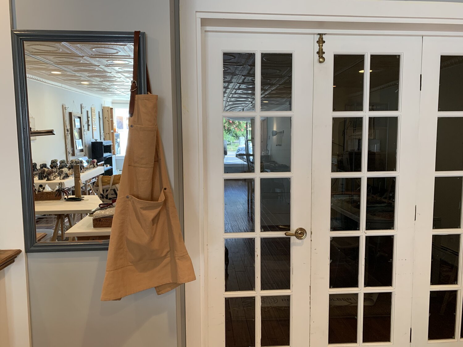 leather-apron-hanging-on-door.jpg