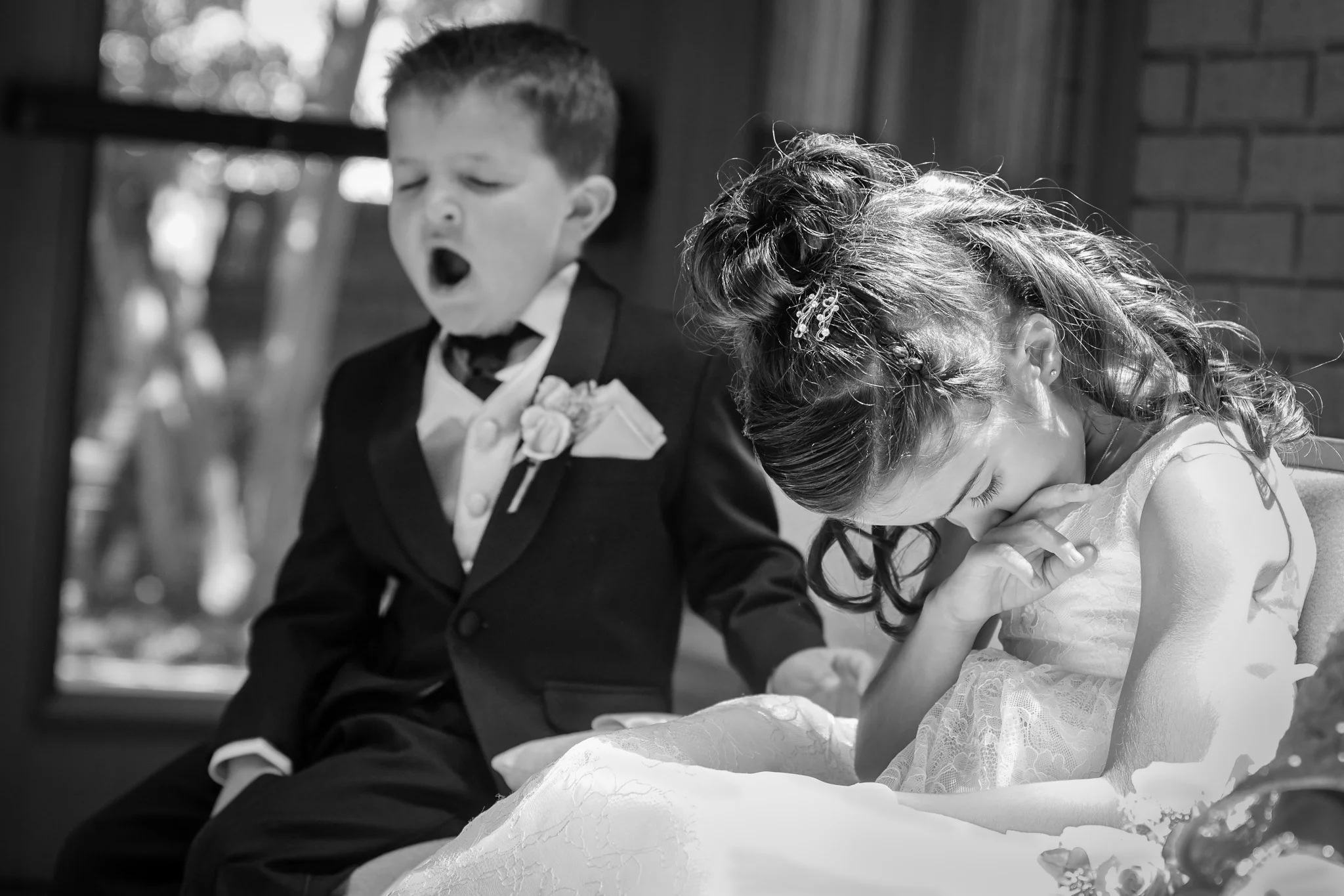 Ring bearer and flower girl yawning and sleeping