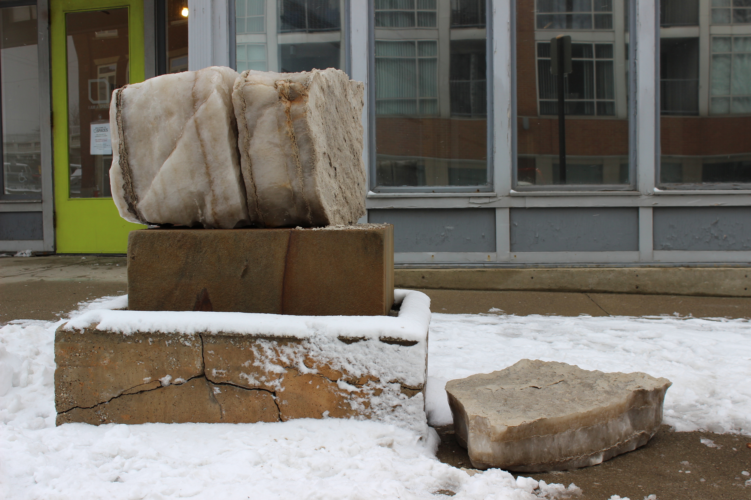 As the weather dissolves the vein of pyroclastic ash the salt block calves a slab of salt onto the ground below - note the absence of snow around the fragment, this is an ancient ocean that has been reactivated to melt the surrounding snow pack. I gathered some of this slush around the salt and measured the salinity: 5.6%.