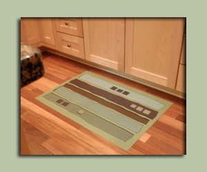  Protect your wood floors with a GraffitiMat.