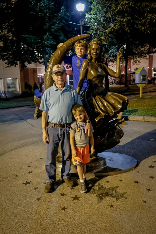 A night in Salem with scary witches and goblins...Little boys running after dark.