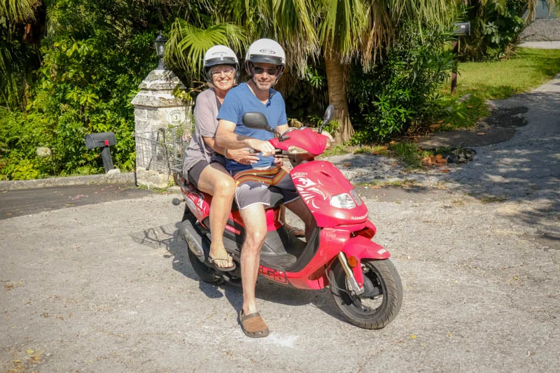 This is probably my one of my favorite photos of all time. One of the things on my bucket list was to ride on a motorcycle. That did not happen because I was so scared. When Chris got this scooter I kind of knew it was my last chance and who better to trust then my son. I hiked up my dress, put on the helmut and hung on tight. Off I went. I can't say I loved it and it was a bit scary but I did it. I knew then, that it wasn't about the motocycle or the scooter, it was about fighting another fear. I'm so glad I did this. Bonus Anniversay gift to myself. Kudos to Chris for being as gentle as he could on the bumpy roads. Special thanks to Liam for taking the shot.