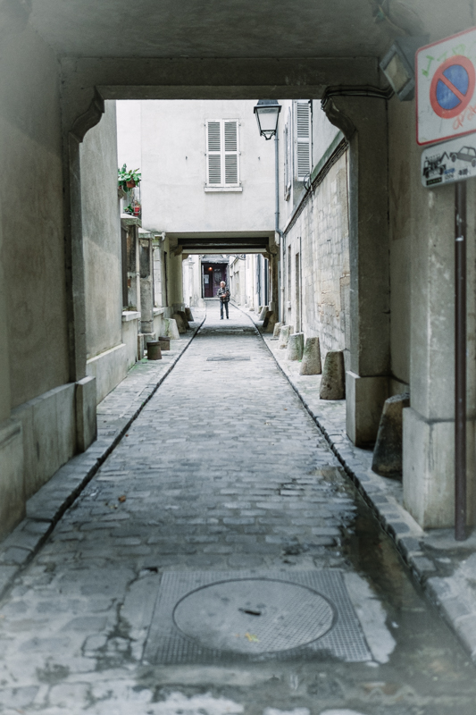 An alleyway leading to the back door of a very old church…I love the old street lamps and cobblestone.