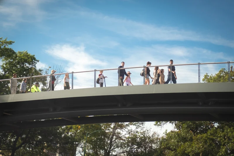 Sunday walkers crossing over the Charles River.