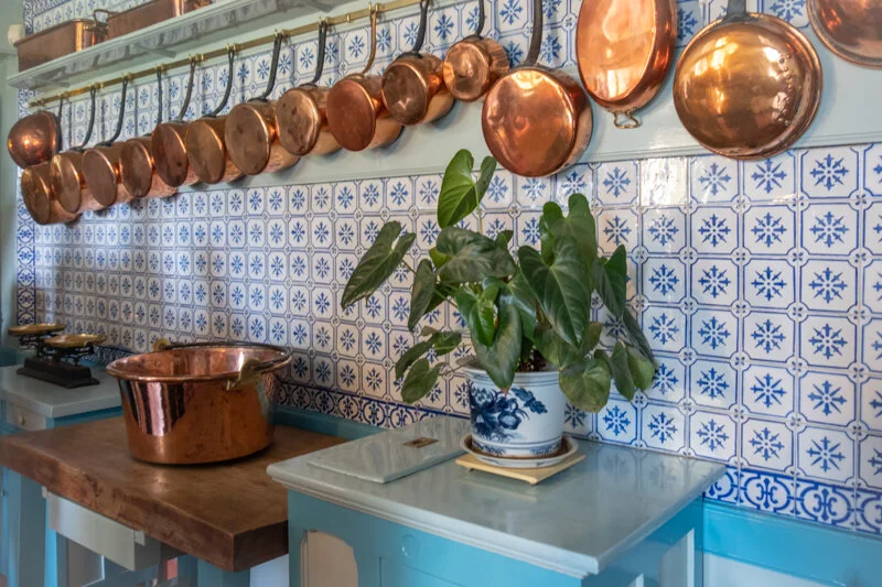 Each room had it’s own color and personality. The kitchen was many different shades of blue. Beautiful light again and lots of copper pans for contrast and texture. The blue kitchen tile reminded me of Holland. I’m guessing he carried the blue over from the dining room so it blended nicely.