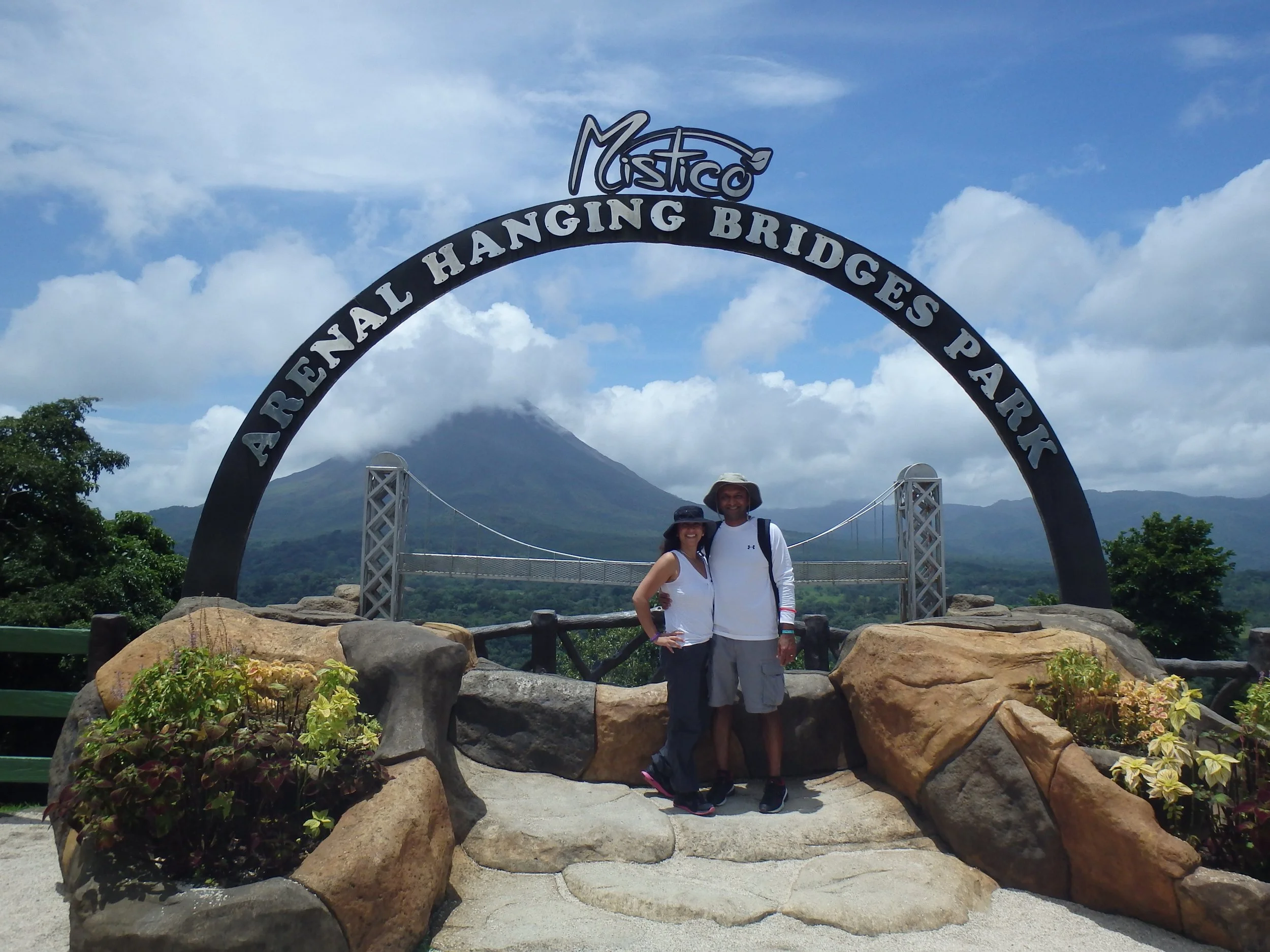 Anjli and her husband at the Mistico Arenal Hanging Bridges Park in Costa Rica.