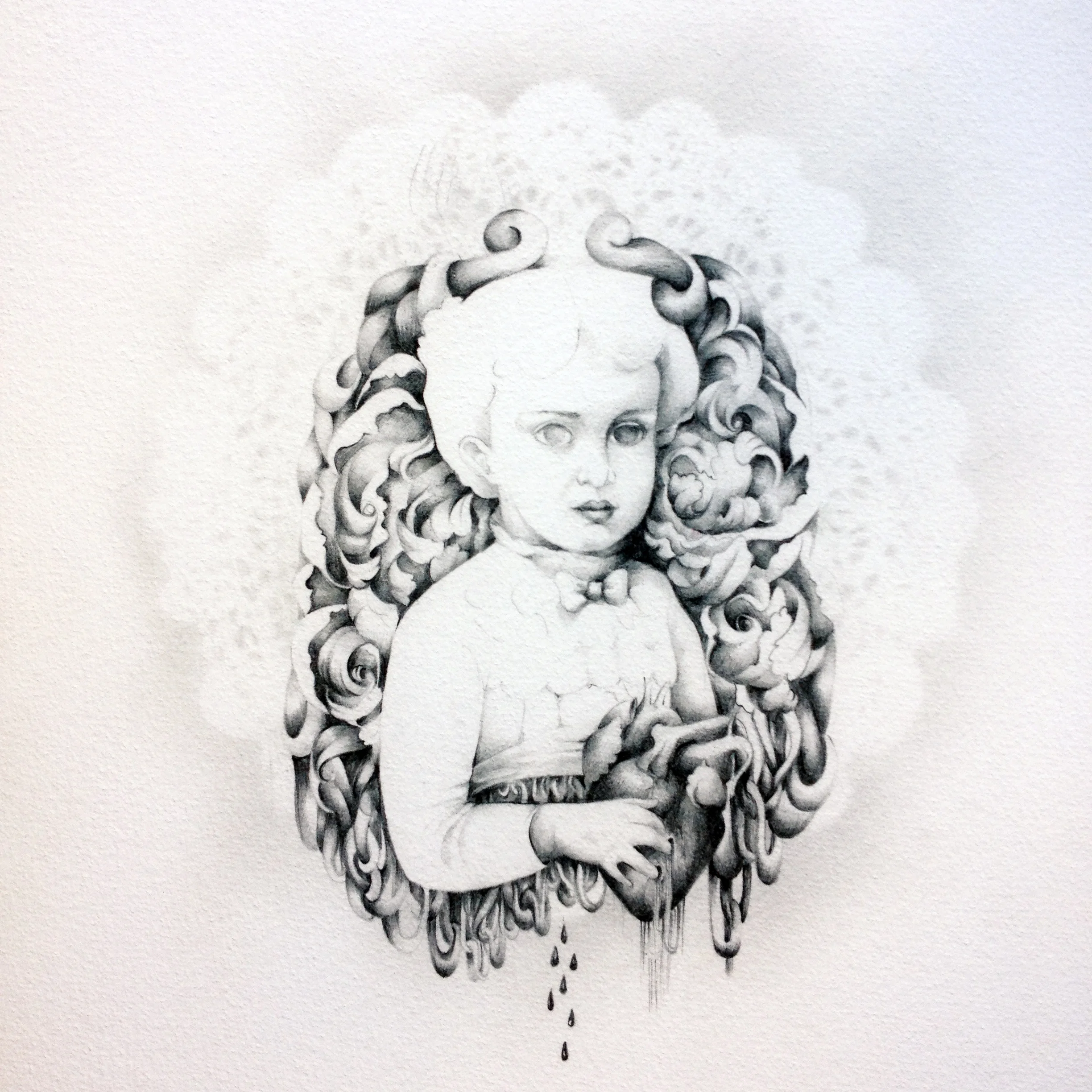 A black and white drawing of a young girl with curly hair, holding a realist heart with dripping blood, surrounded by swirling abstract patterns.