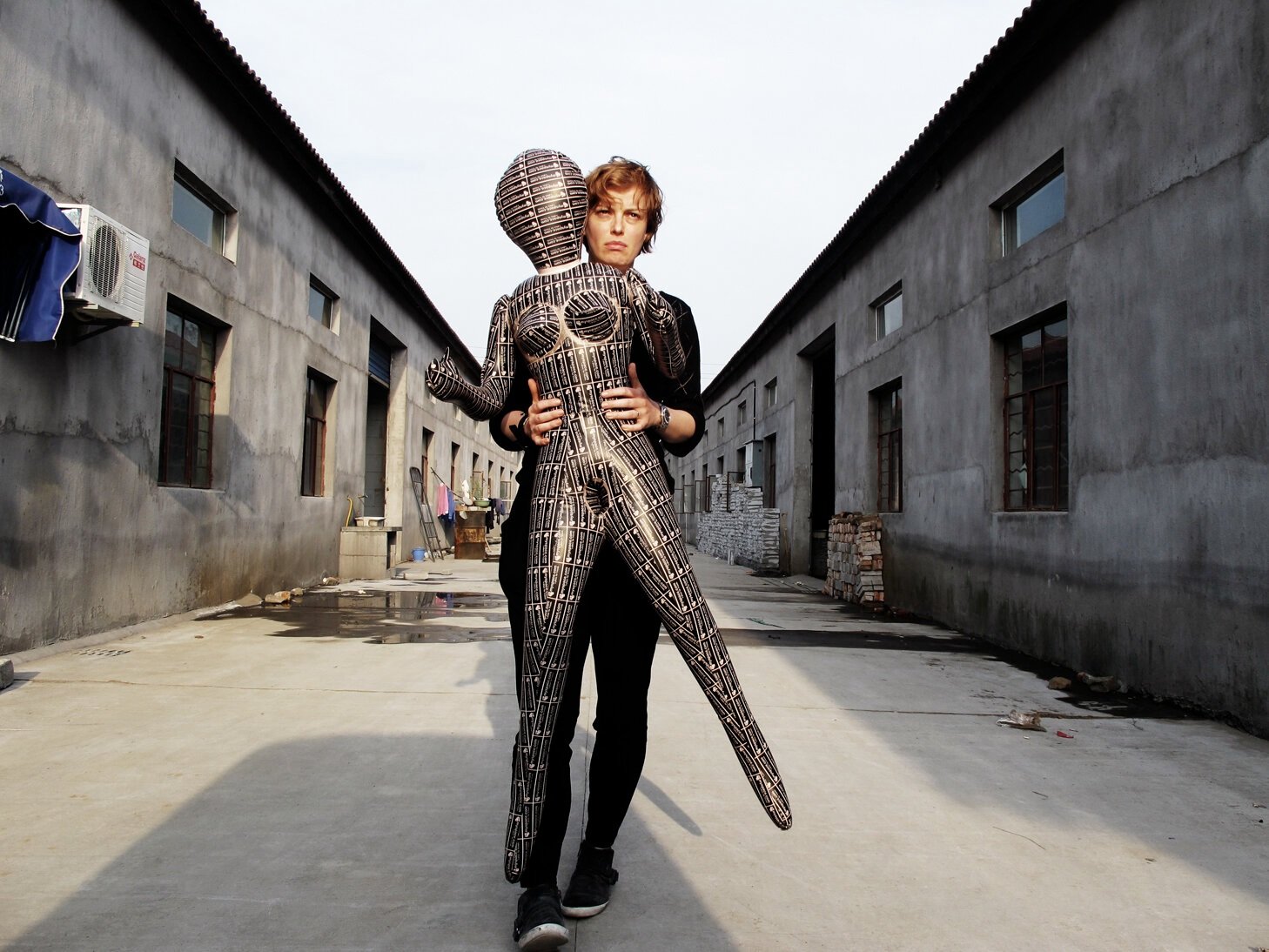  Susanne Junker with her self-doll, Ningbo, China, 2011. 