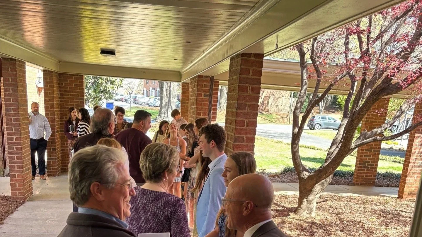 Youth Sunday March 2025 greeting people after service.jpg