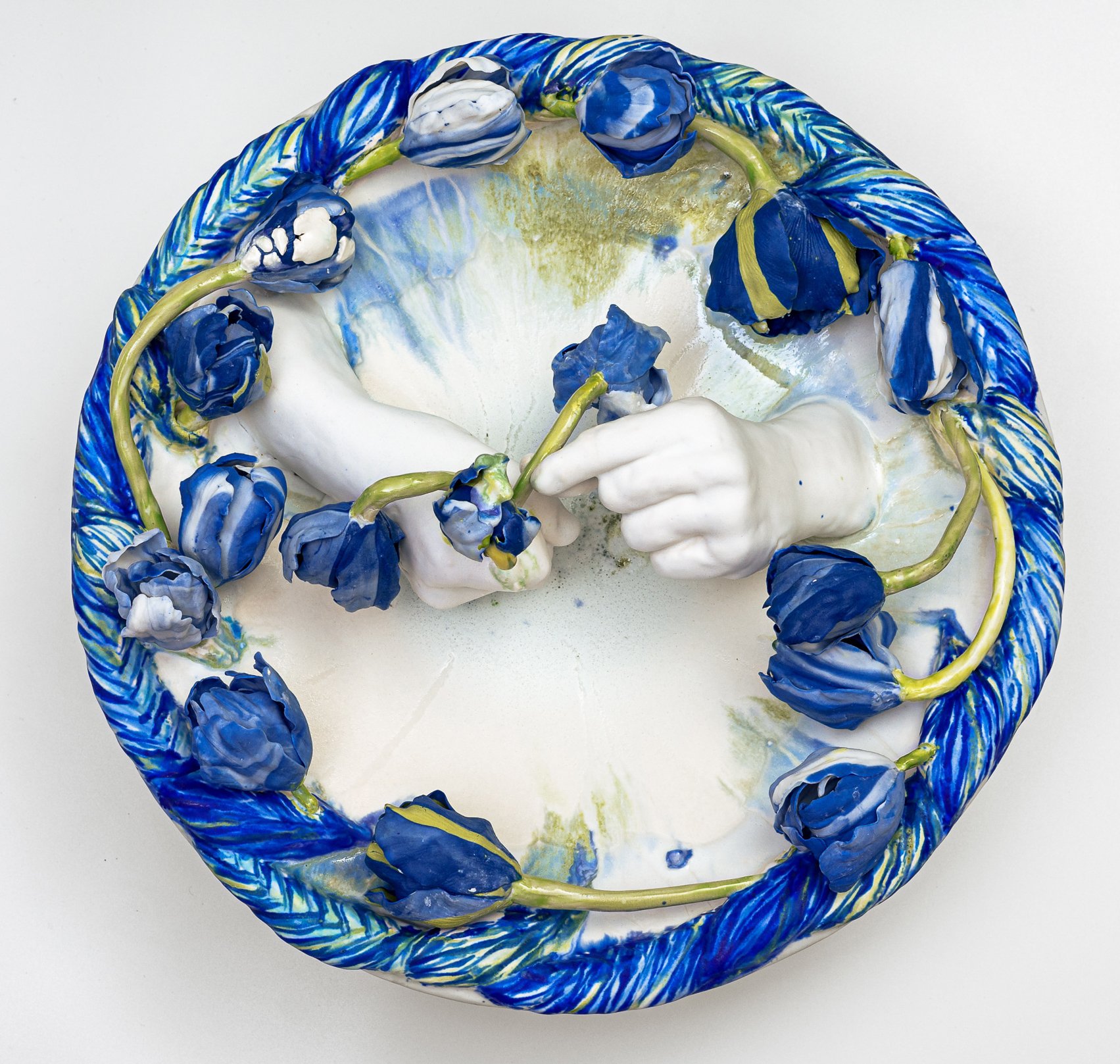 We imagined blue flowers and ripped them, divine, from the earth.