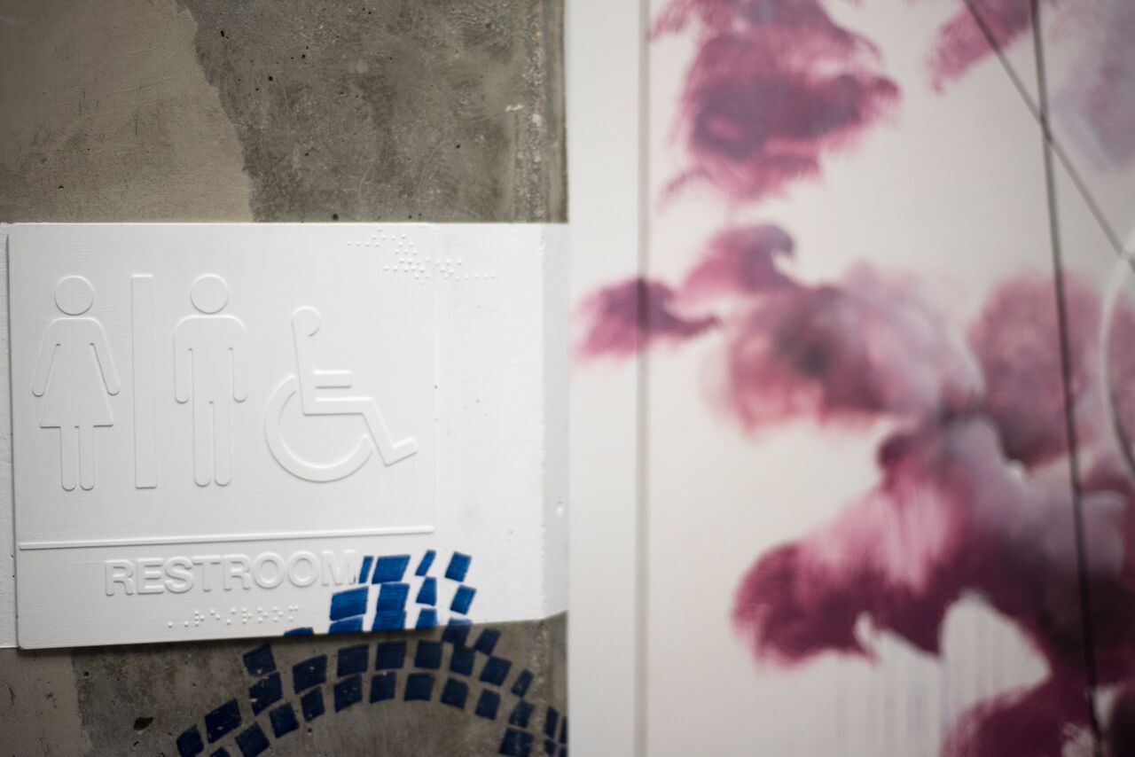 unexpected bathroom sign