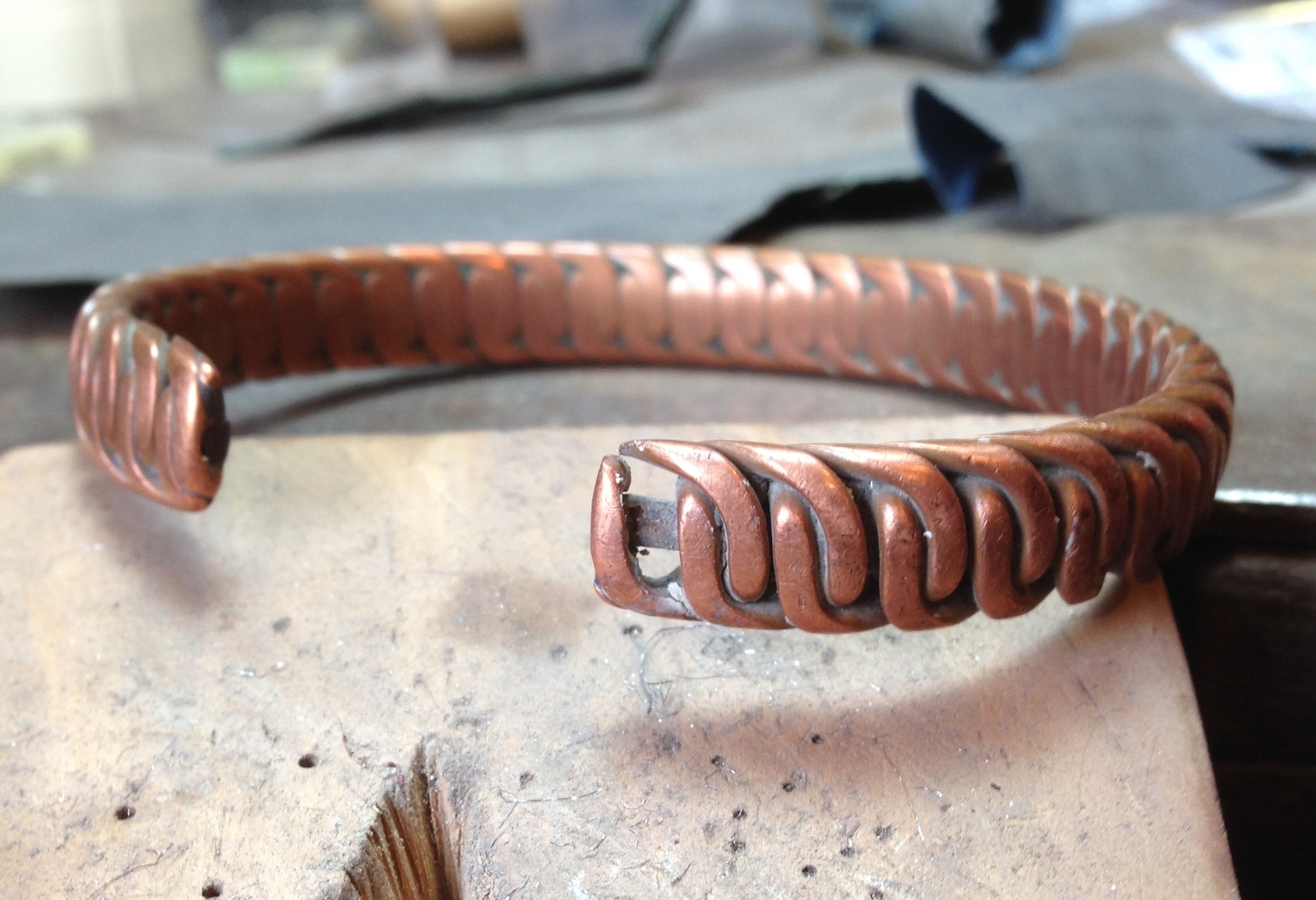 The copper bangle showing how part of the end had snapped off.