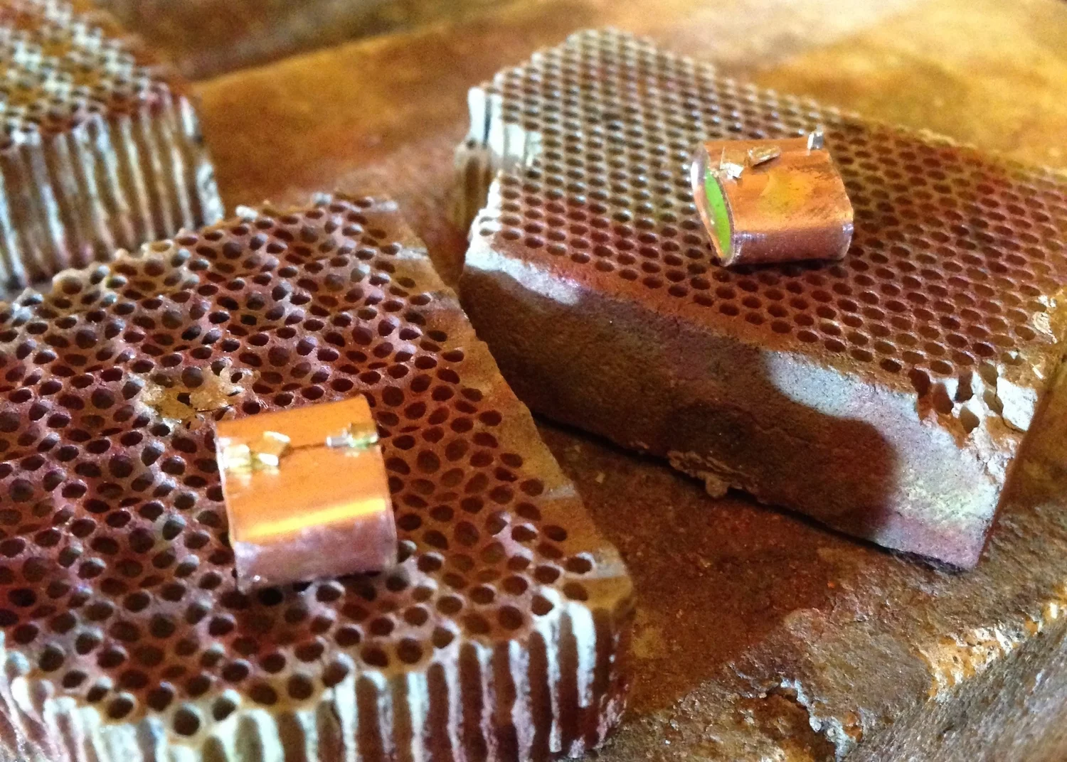 The beginnings of the two new end caps made from a bit of recycled copper.