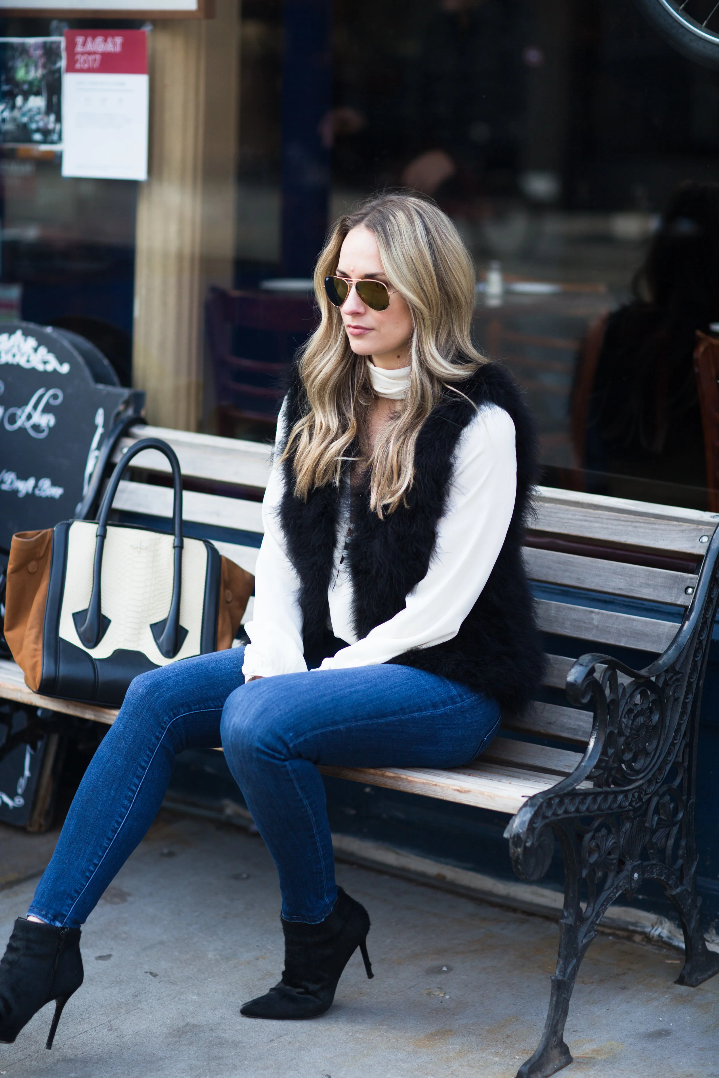 feather vest with blouse