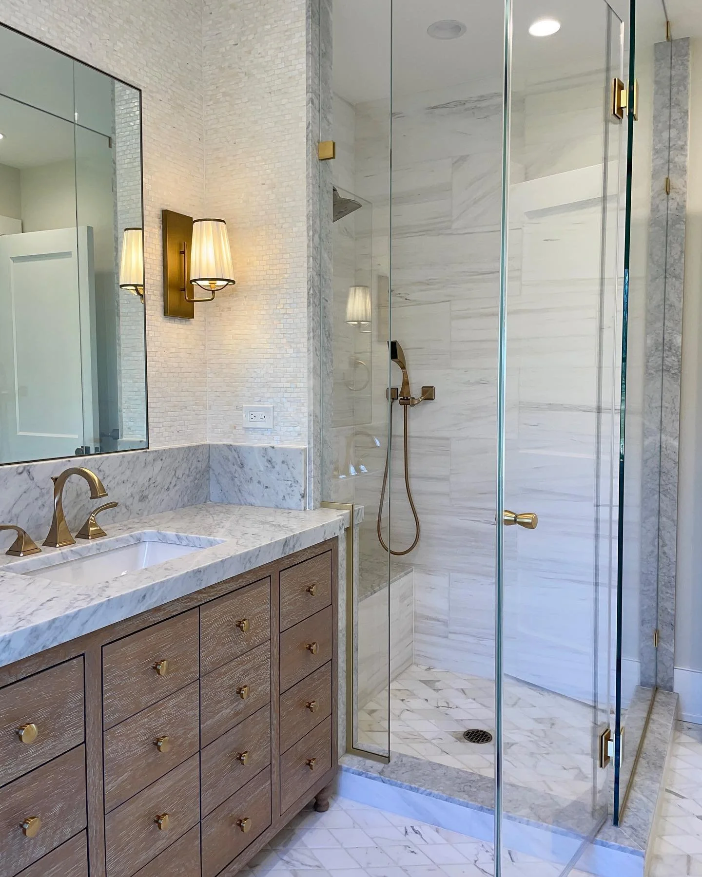 A few stunning bathroom details from our Malvern project 

Architecture &amp; Design: Abby Schwartz Associates 
Builder: Pohlig Homes
Cabinetry: Christiana Cabinetry 
Tile: Devon Tile Design Studio
Slabs: AAA Hellenic Marble

#mainlinehomes #customho