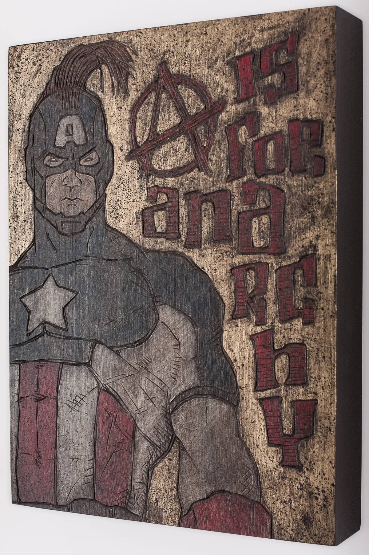 Alex Diamond: A Is For Anarchy (2016) acrylic paint, woodcut, 18 x 24 x 3 cm (7.8” x 7.8” x 1.2”)
