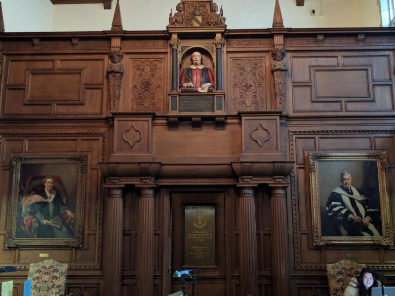 Inside the Folger Reading Room, featuring a bust of Shakespeare modeled on the one in Holy Trinity Church, portraits of Emily and Henry Folger, and the niche where their ashes are interred.