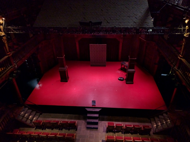 The stage of the Folger Theatre, designed as a replica of an Elizabethan playhouse.