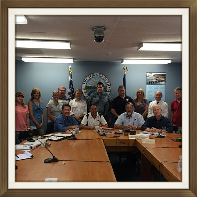 Members of Durham's Leadership Team meet with Krystin Ward (far left) and Ray Grizzle (far right) this week to learn about oyster cultivation in Little Bay. -Courtesy Todd Selig