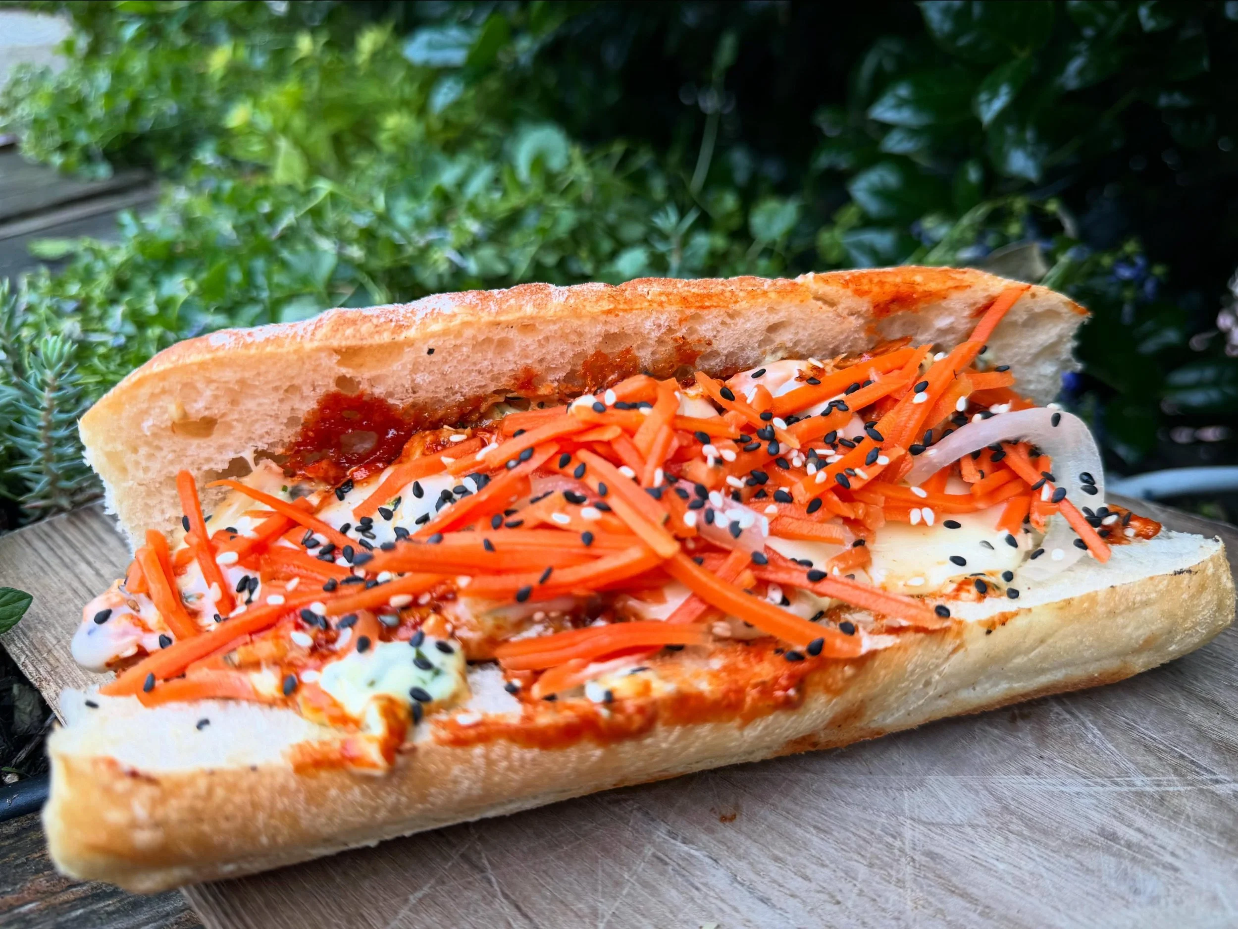 Our weekend special is the &ldquo;Homie &amp; Marge&rdquo; with gochujang honey chicken, cooper sharp cheese, pickled onions &amp; carrots, sesame seeds and cilantro mayo on a toasted sub roll.
Our soups of the moment are Miso Spinach Mushroom or Man