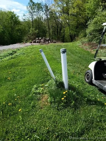 Utility pull drop off location along right of way to the land