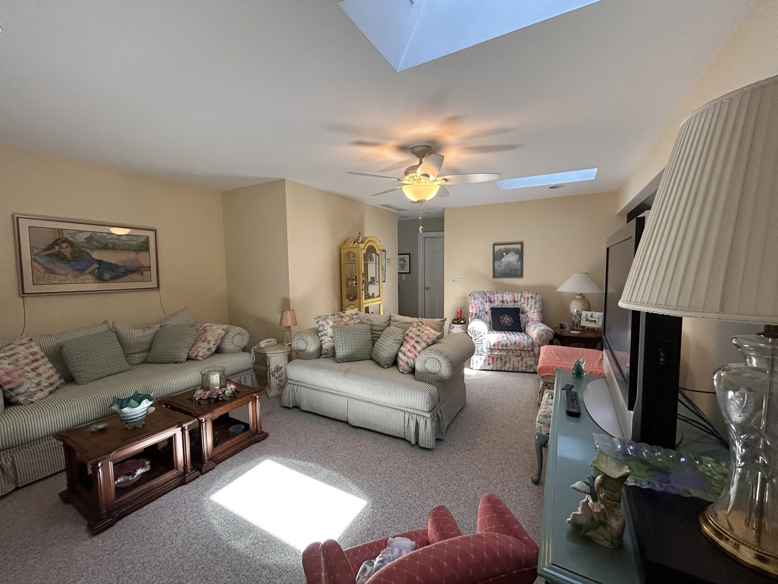 Upstairs den/office area with balcony overlooking living room