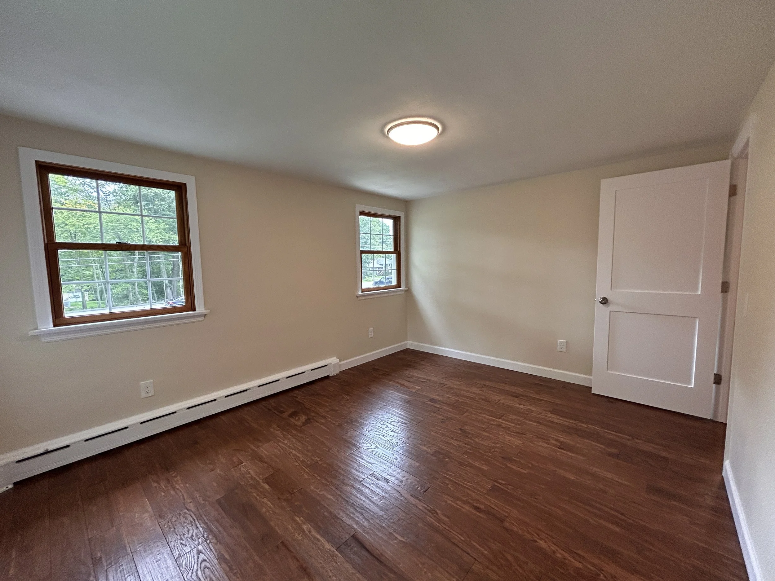 Bedroom 3 with front yard views