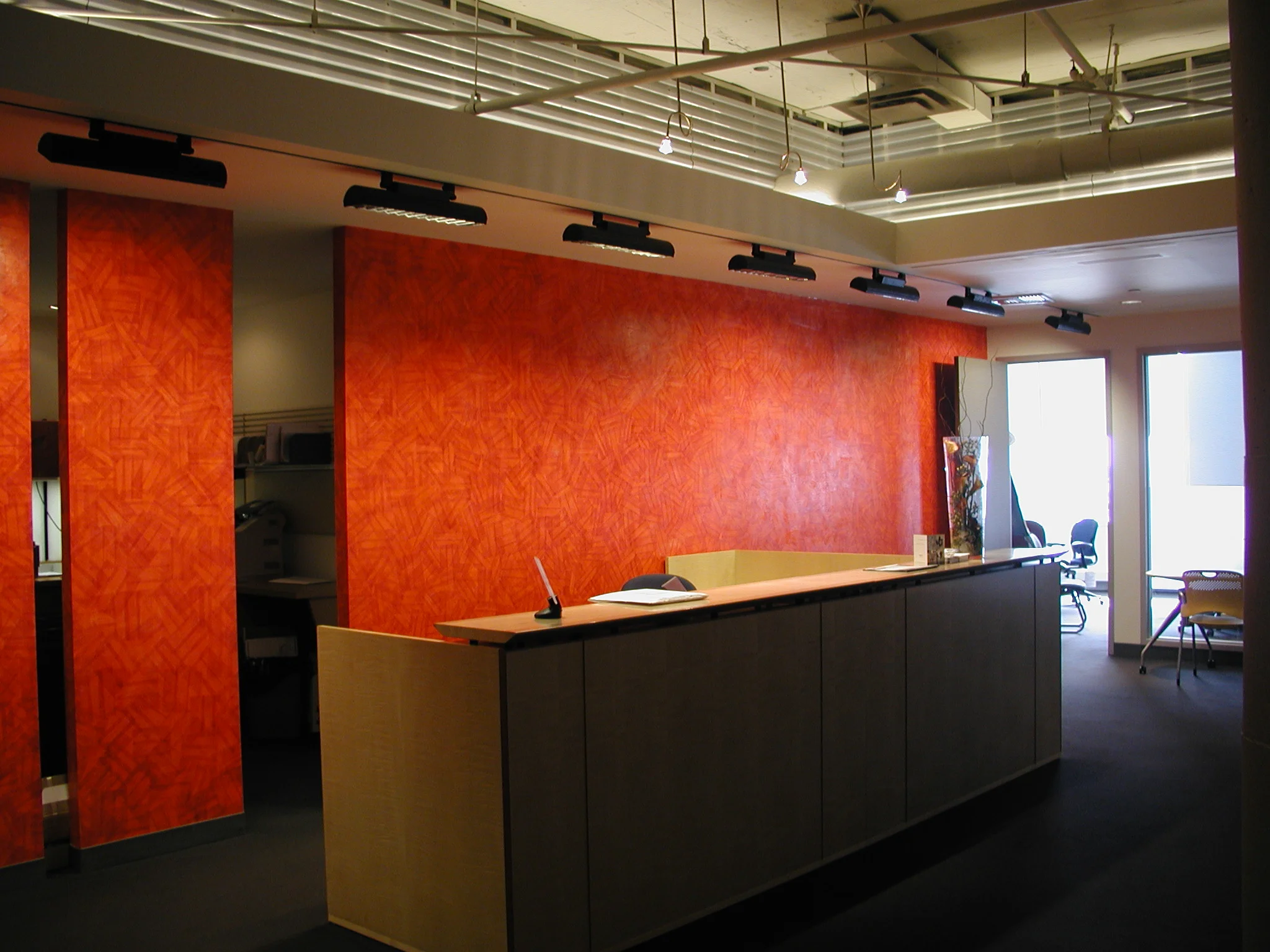   Creative Office Pavilion Boston, Massachusetts   Lobby Renovation  After years of reconfiguration, the furniture dealership requests a new lobby to invite clients down a very long access corridor into the showroom. &nbsp;We remove as much as possib