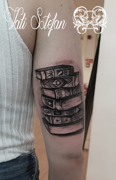 Vali fineline books on arm.jpg