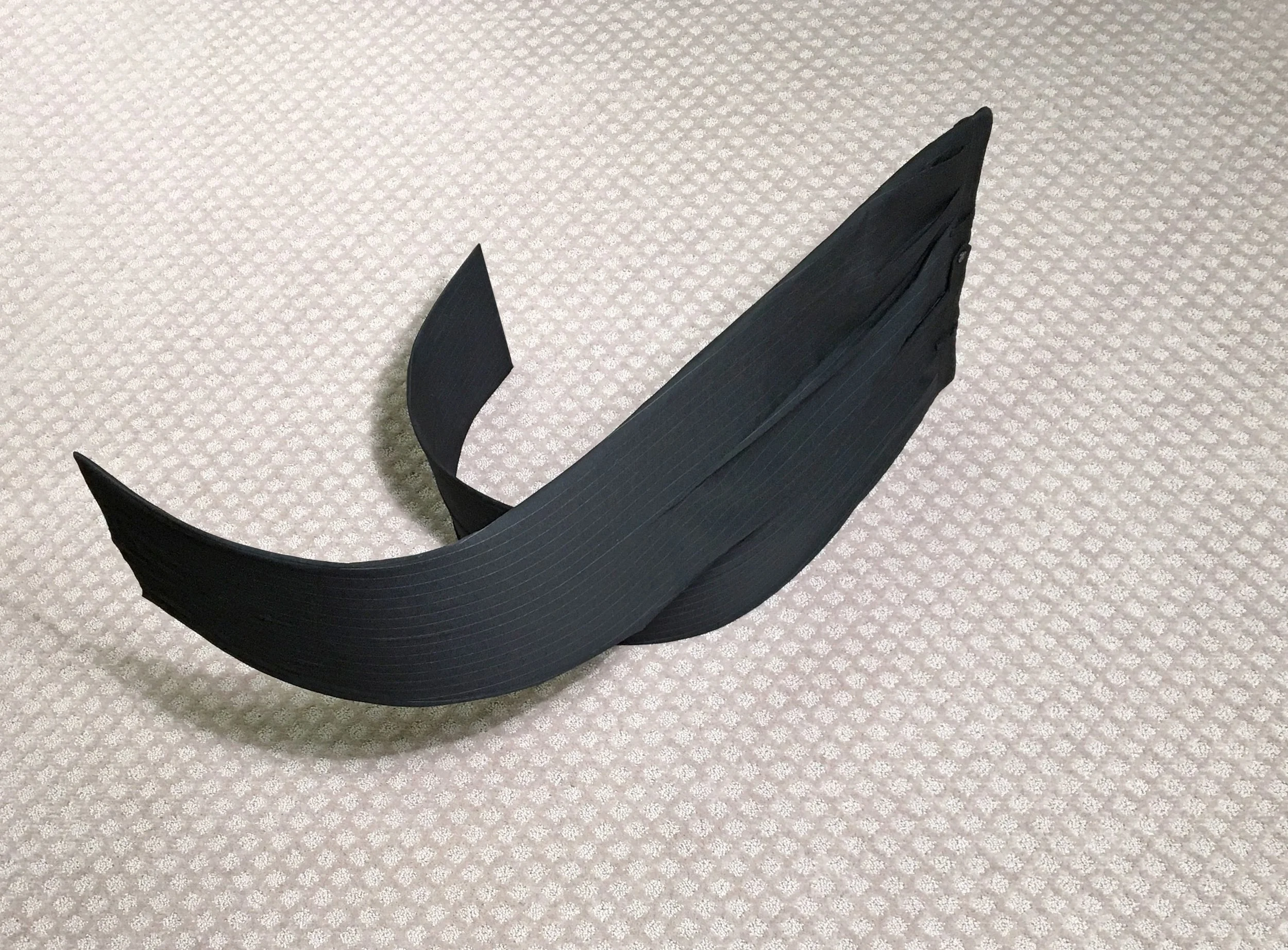 Pants Sculpture XII, 2016. Dress pants on aluminum, carpet. 19" x 32" x 18"