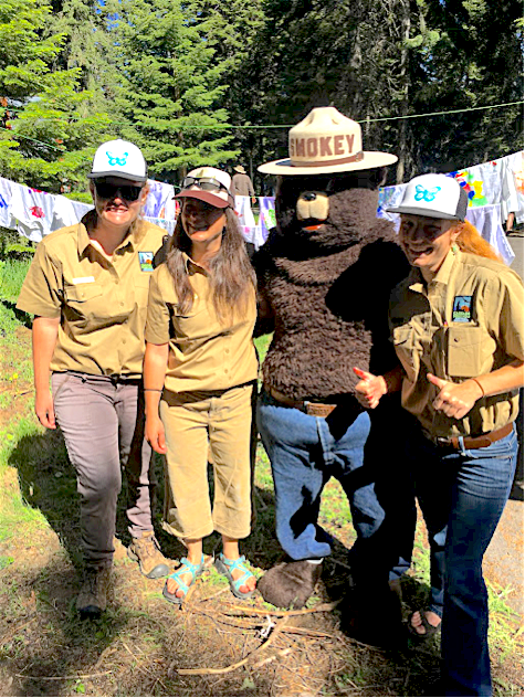 Ranger interns Morgyn, Becky, and Elizabeth (l to r) with Smokey Bear at BLM Free Fishing Day, June 6, 2017. BLM photo