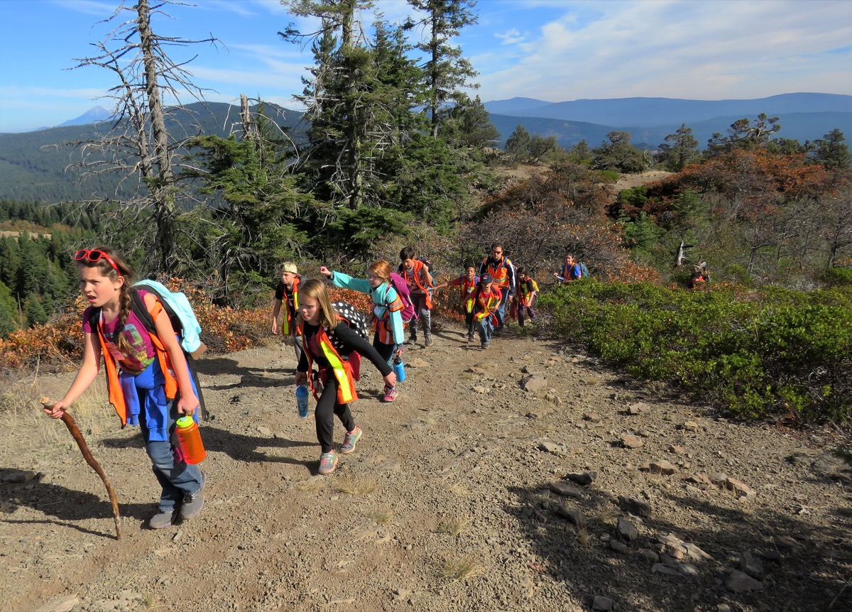 Students hike the Hobart Trail in the monument