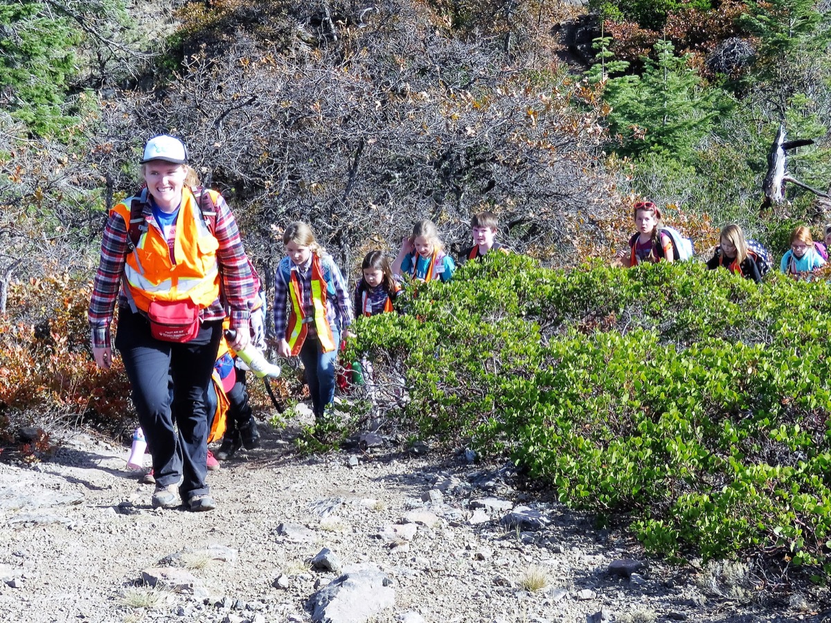 Morgyn Ellis, SOU Environmental Education graduate student leads her group up the trail