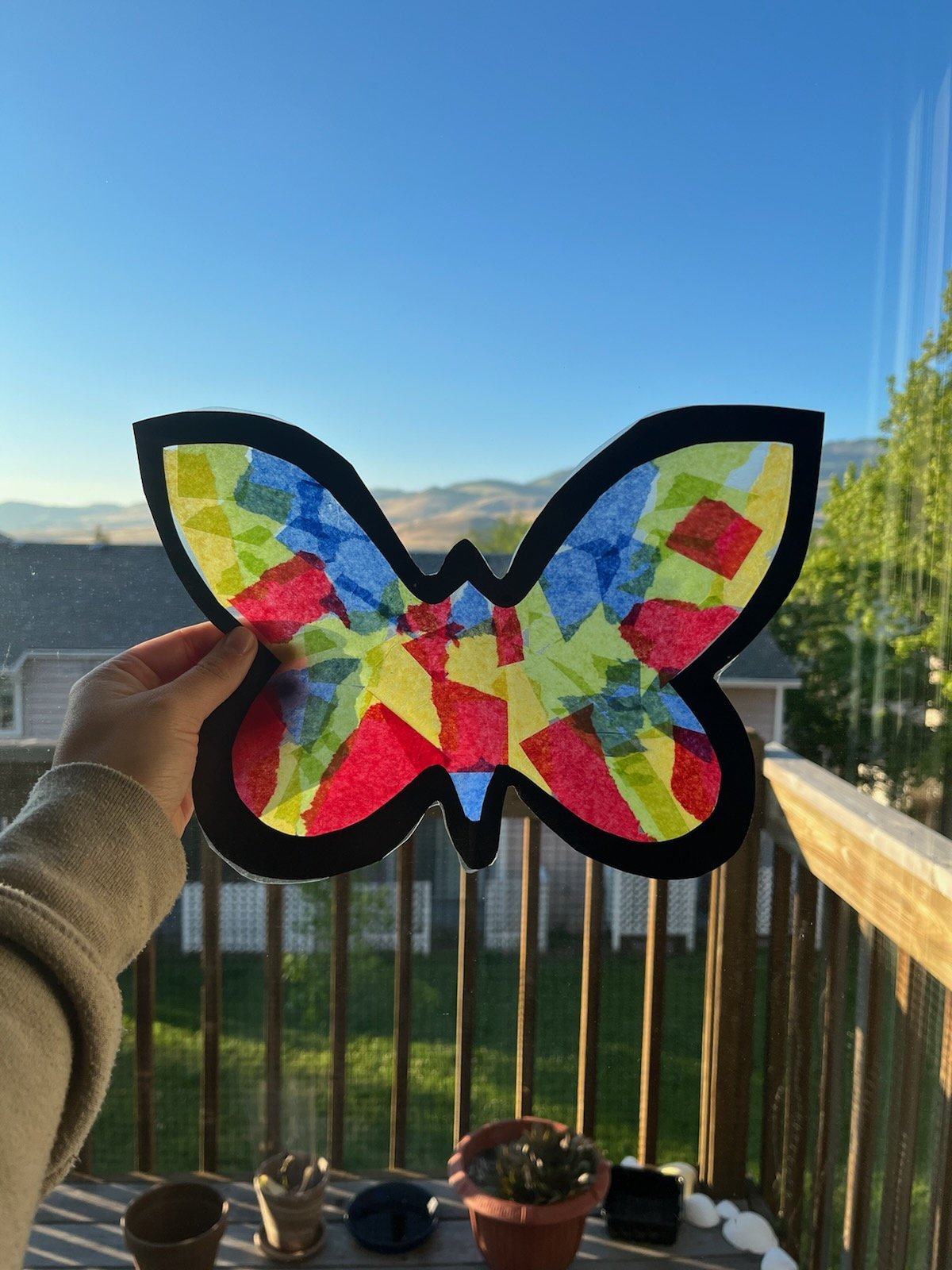  After learning all about butterflies, younger campers had the chance to make their very own in this “stained glass” craft 