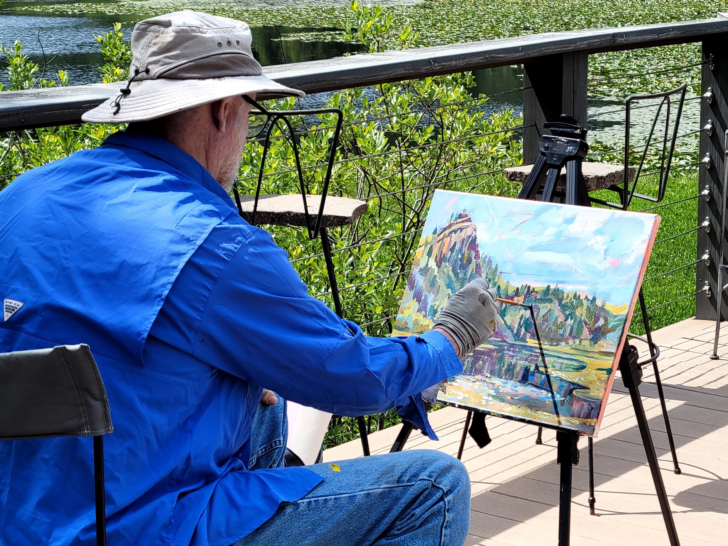 Erik Sandgren working on his painting of Hobart Lake