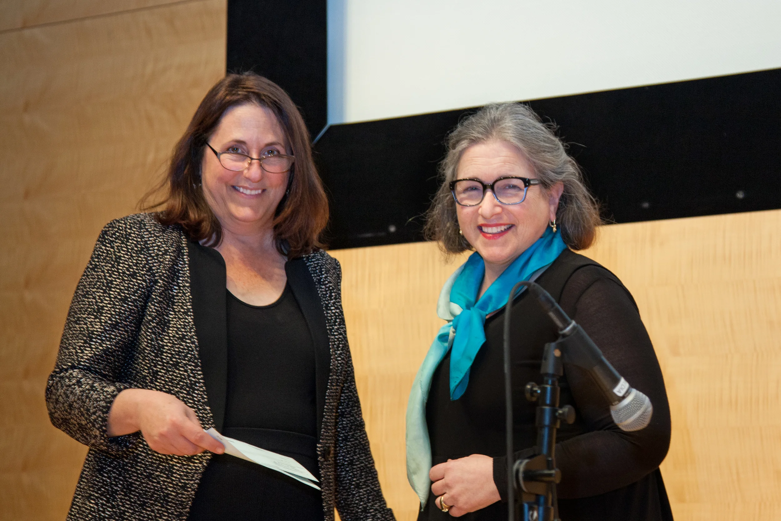 DEBRA SURKIN HANDING THE SCHOLARSHIPS TO ROSE MUKHAR