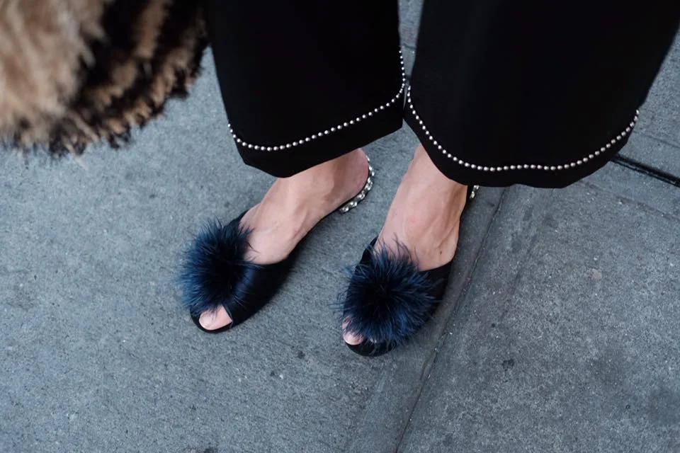 Details: Alexander Wang trousers, Miu Miu sandals.