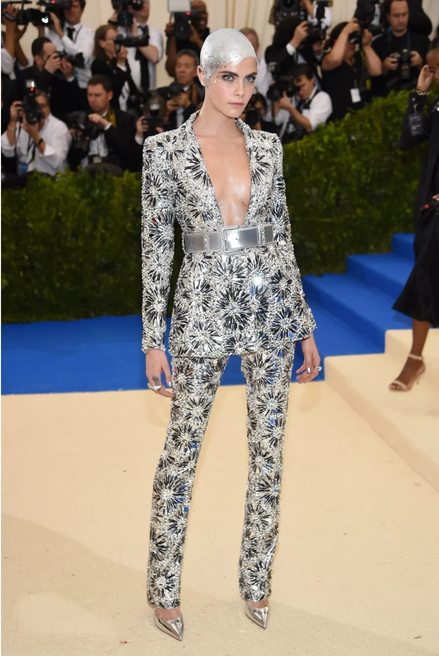 Cara Delevingne wears Chanel.