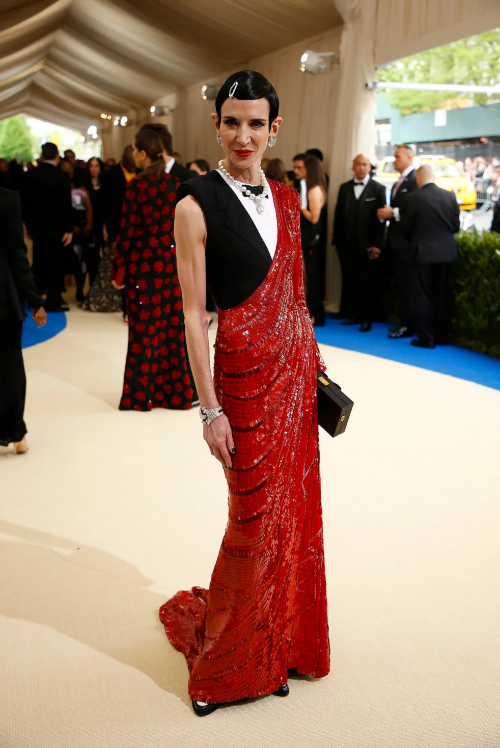 Amy Fine Collins wears Thom Browne.