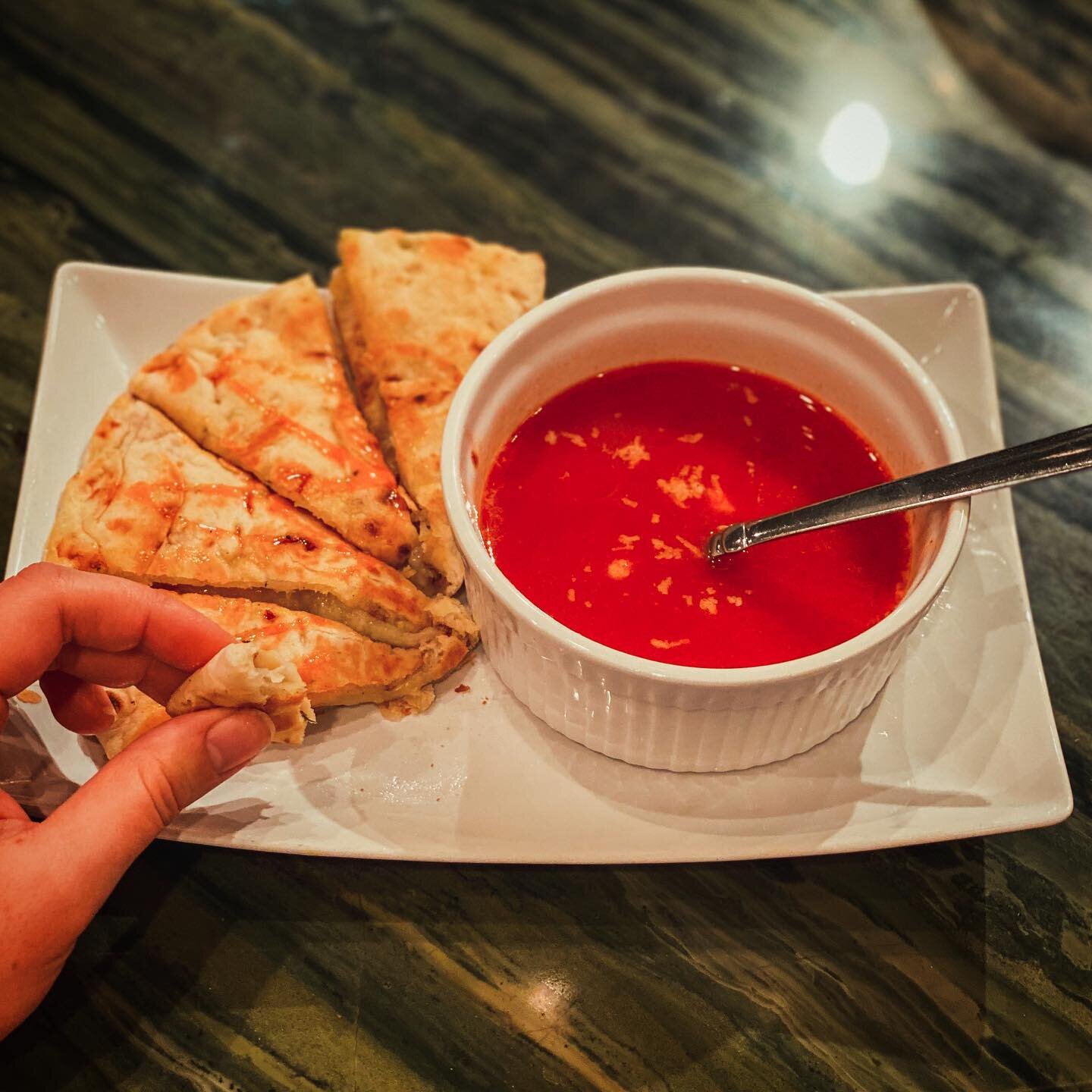 EDIT: apologies for the dark photo- we moved and haven&rsquo;t found my photography lamp yet! 

I made @halfbakedharvest &lsquo;s naan grilled cheese last night andddd to put it lightly, it was ahmazing! And I cheated. Big time. I used garlic naan fr