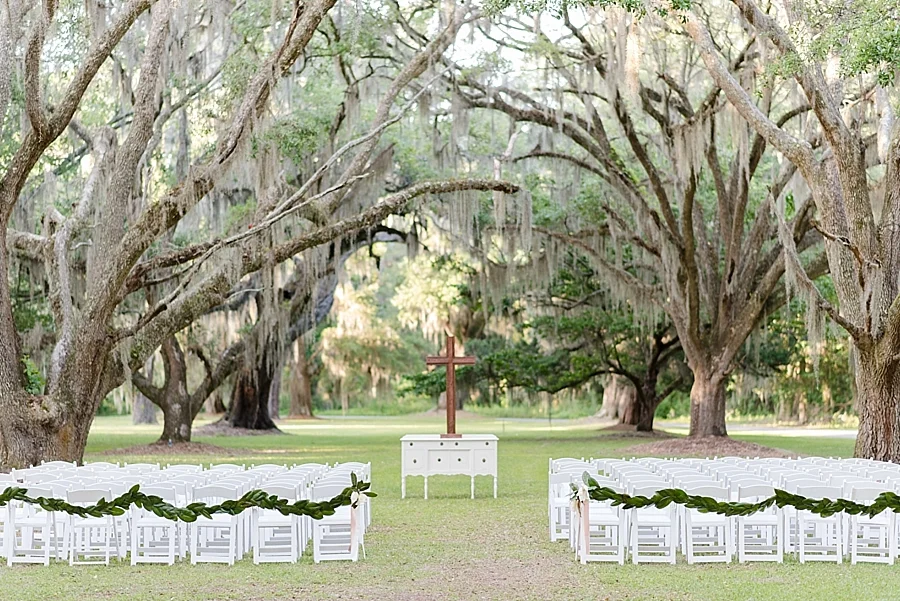 This ceremony site at Litchfield Plantation in Pawleys Island, SC was photographed at golden hour. The sun is low on the horizon and the this spot has been left in open shade, making the light even and beautiful.