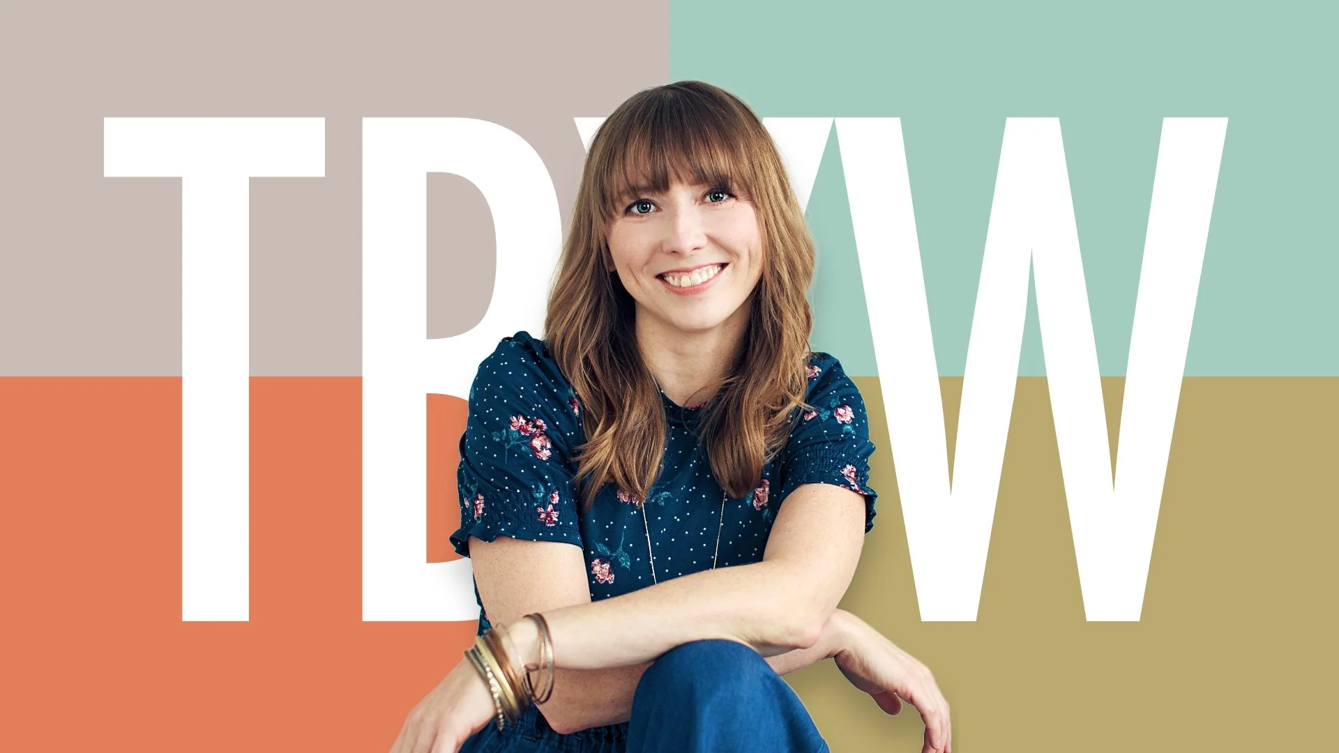 Nicole Lange smiling in floral top with "TBYW" in background.