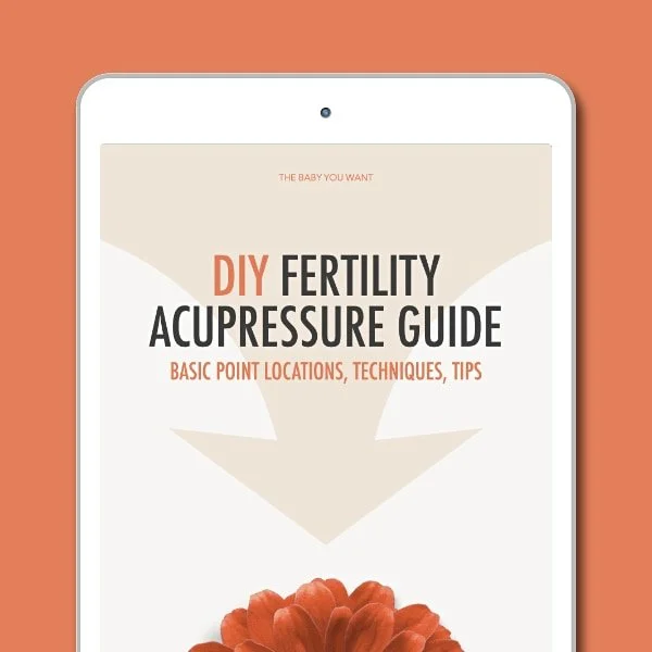 Guide cover reading DIY Fertility Acupressure Guide, with an image of a large orange flower and in the background a tan arrow pointing downwards.