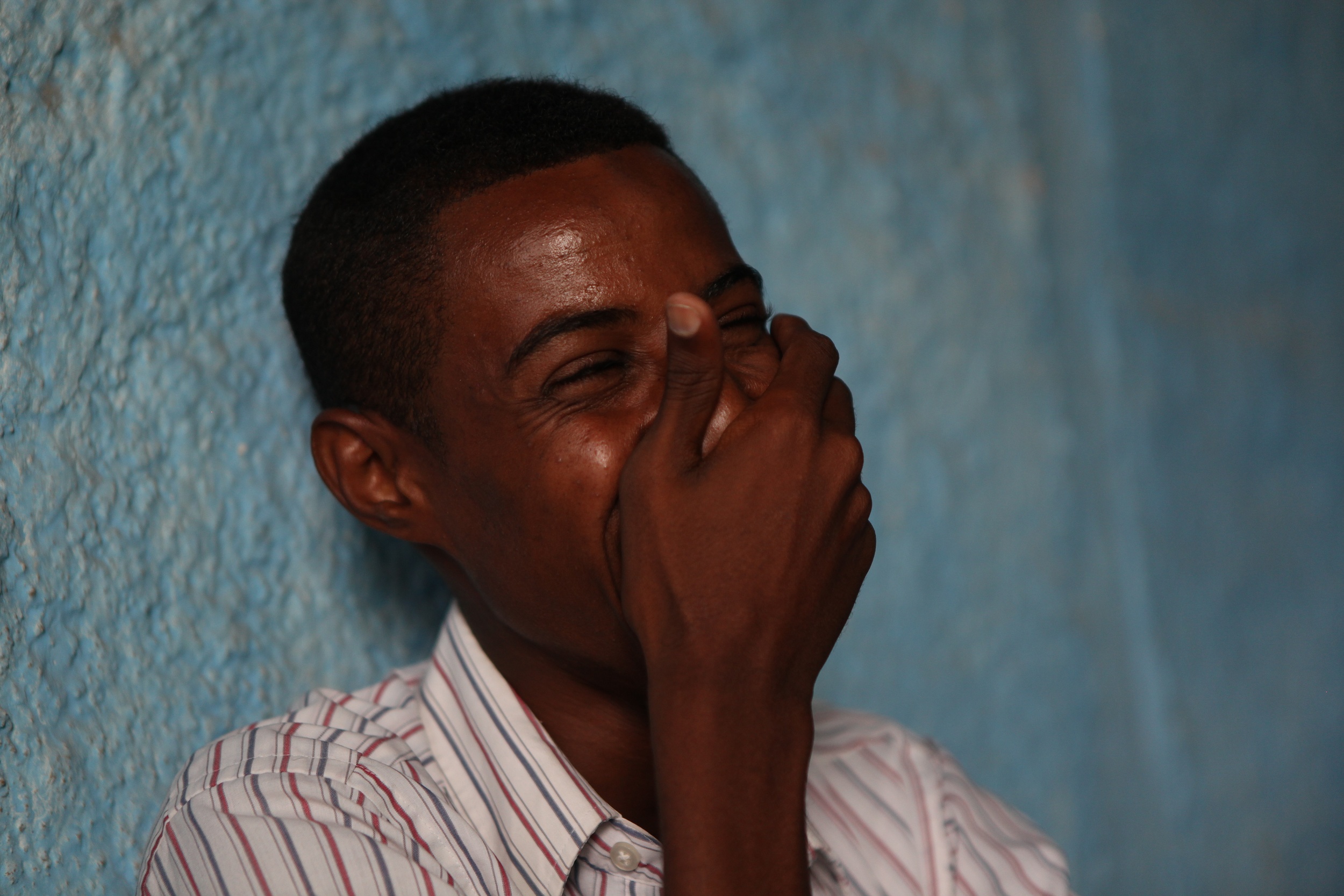 Mohamed laughs freely for the first time in years, after his town of Hudur was liberated from Al Shebab by Somali government forces, backed up by African Union troops