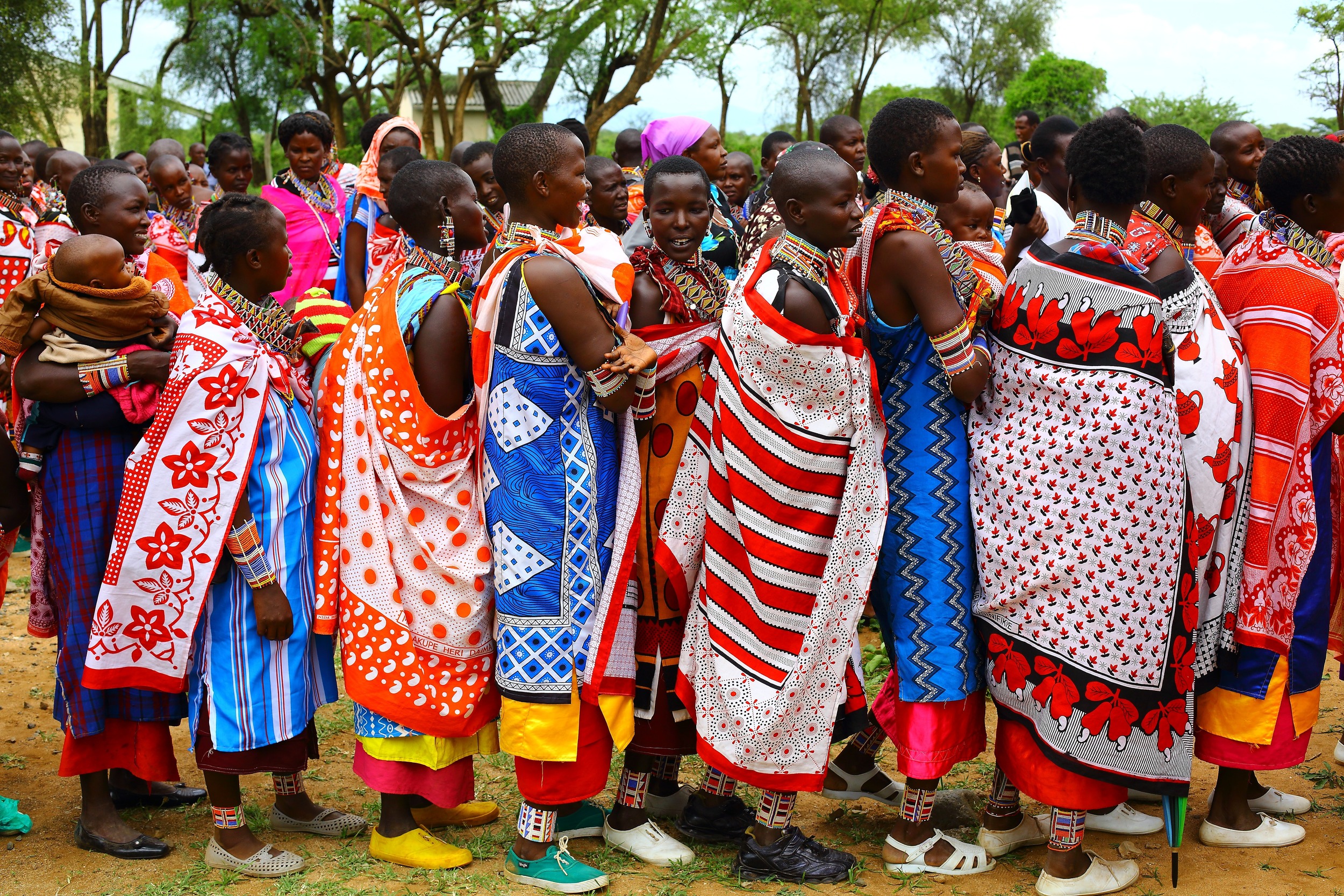 Maasai women queue up to vote for their preferred candidate in Kenya's election