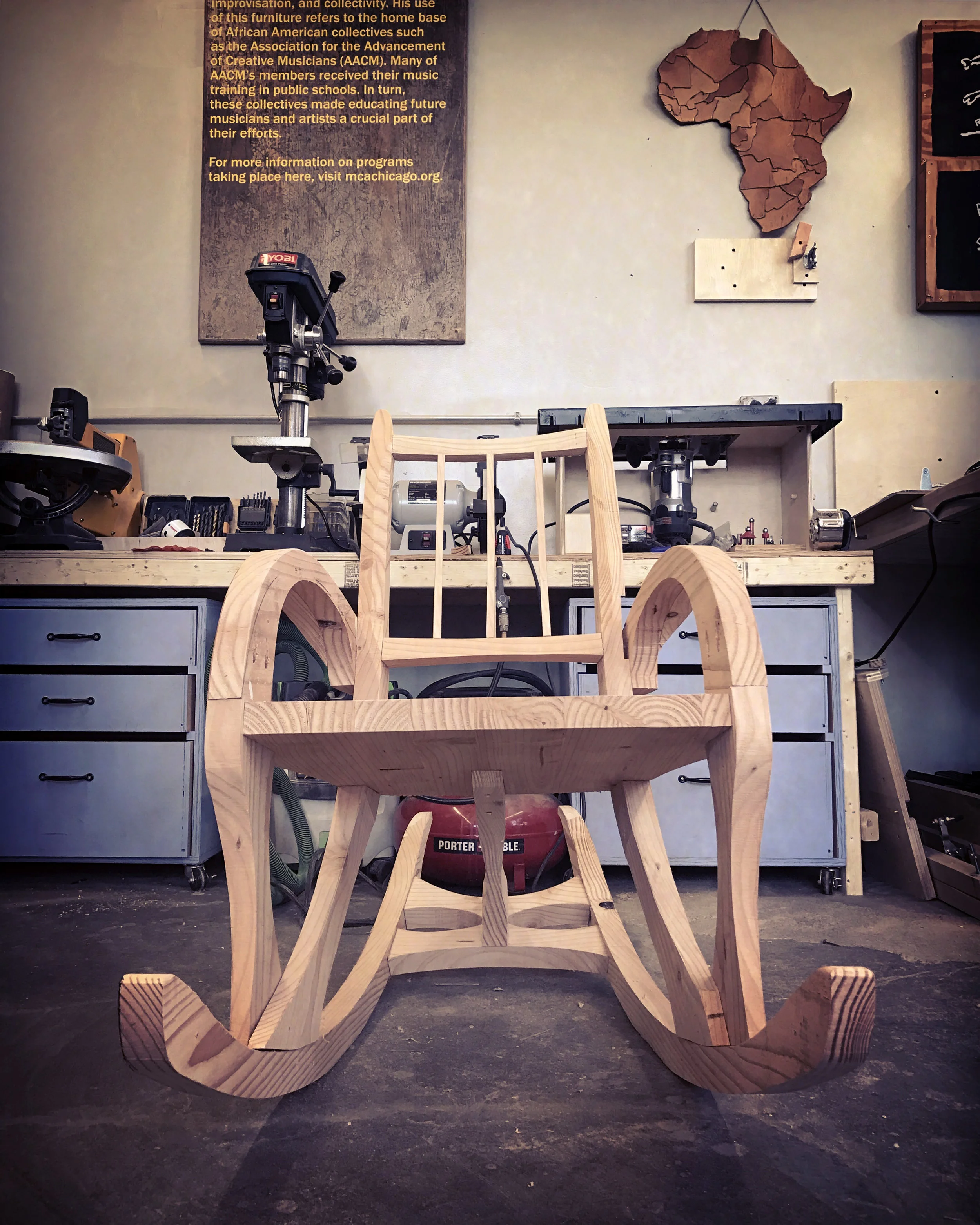 the rocking chair prototype. it has a ratcheting system that slowly clicks a piezo battery-less switch (see video) on and off as people rock.